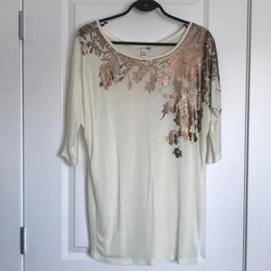 Tunic with bronze appliqué design